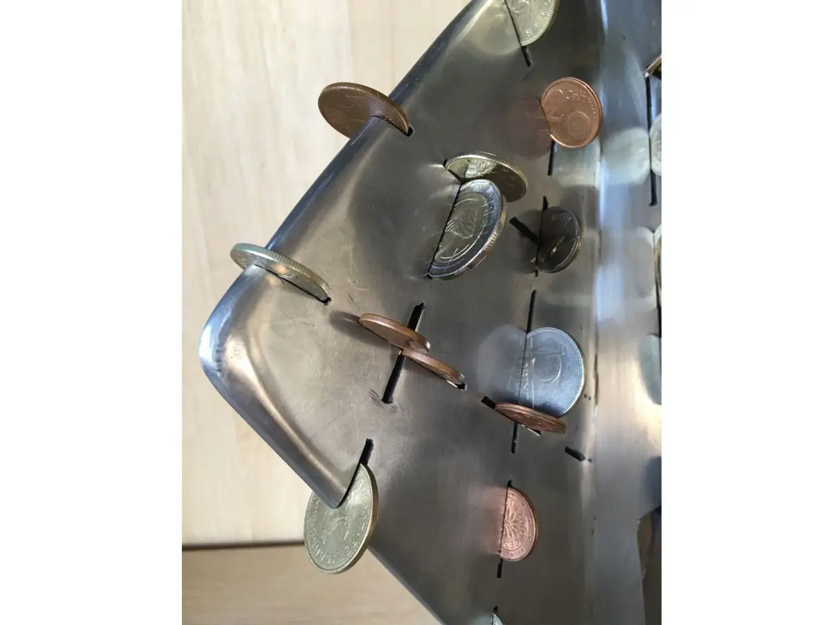 "Scrape penny" sculpture of Metal - 12