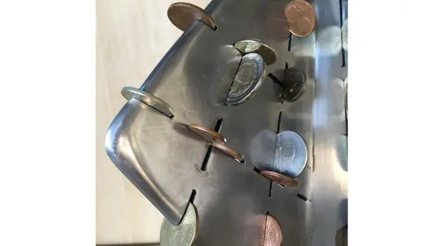 "Scrape penny" sculpture of Metal (12)