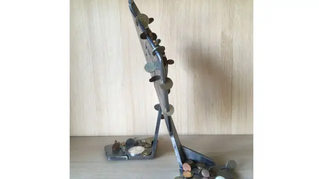 "Scrape penny" sculpture of Metal (5)