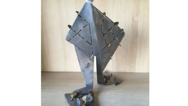 "Scrape penny" sculpture of Metal (7)