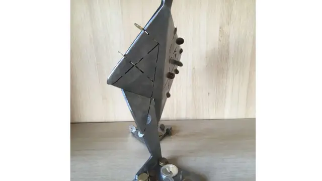 "Scrape penny" sculpture of Metal (8)